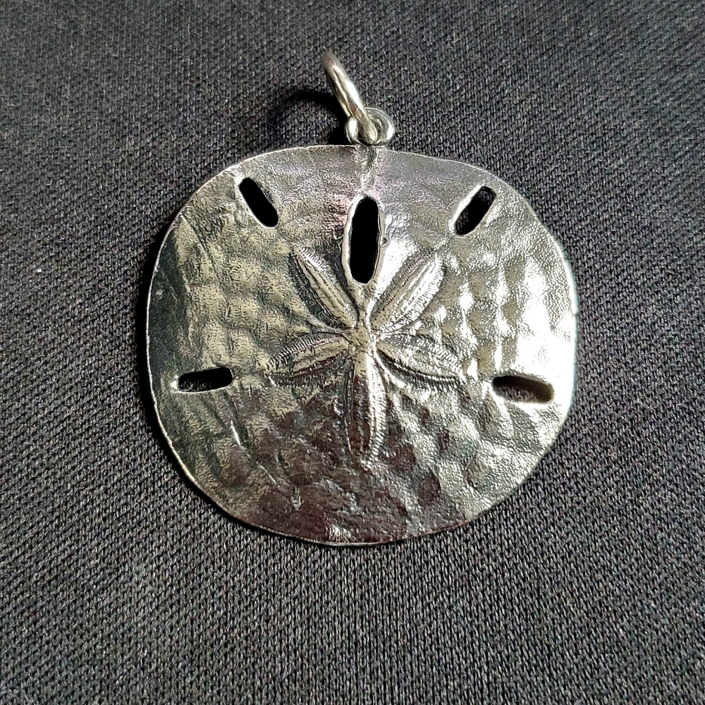 Retired James Avery Sand Dollar pendant
